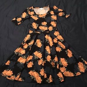 LulaRoe Nicole dress with yellow rose pattern